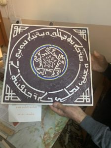 Example of Aramaic calligraphy on wood by elderly Chaldean Christian Iraqi calligrapher from Alqosh town.