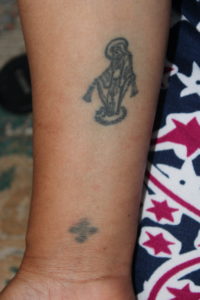 Person's arm with two Coptic tattoos. Credit: Samia Hannat